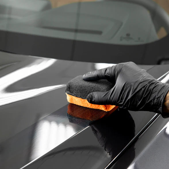 Ceramic coating application on a luxury vehicle